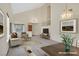 Inviting living room staged with sofas, a dining set, and bright decor, showcasing open layout at 15 Richland Acres Ct, Henderson, NV 89074