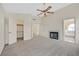 Spacious main bedroom featuring a fireplace, ceiling fan, closet, and ensuite bathroom at 15 Richland Acres Ct, Henderson, NV 89074