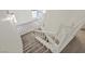 A view of the staircase with white railing at 15 Richland Acres Ct, Henderson, NV 89074