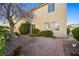 Rear exterior with paver patio and a low maintenance backyard at 1712 Warrenville St, Las Vegas, NV 89117