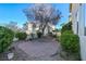 A paver patio and drought-tolerant landscaping defines this cozy backyard at 1712 Warrenville St, Las Vegas, NV 89117