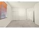 Bedroom with carpet, a double door closet, and natural light coming in through a window at 1712 Warrenville St, Las Vegas, NV 89117