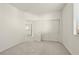 Empty bedroom with carpet, a double door closet, and natural light coming in through a window at 1712 Warrenville St, Las Vegas, NV 89117