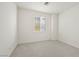 Minimalist bedroom featuring carpet, and natural light coming in through a window at 1712 Warrenville St, Las Vegas, NV 89117