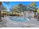 Sparkling community pool with lounge chairs and shade area at 1712 Warrenville St, Las Vegas, NV 89117