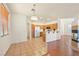 Bright kitchen featuring tile floors, stainless appliances, and breakfast bar at 1712 Warrenville St, Las Vegas, NV 89117