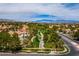 This aerial captures the beautiful network of tree-lined streets and residences in this premier neighborhood at 1712 Warrenville St, Las Vegas, NV 89117