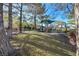 Community playground featuring modern equipment and mature shade trees at 1712 Warrenville St, Las Vegas, NV 89117