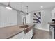 Modern kitchen with stainless steel appliances, a farmhouse sink, and plenty of counter space at 1836 Soto Ln, North Las Vegas, NV 89032