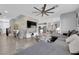 Spacious living room features modern decor, a stylish fan, and an open-concept layout at 1836 Soto Ln, North Las Vegas, NV 89032