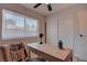 Bright office space with a wooden desk, comfortable chair, and ample natural light at 1847 Avacado Ct, Henderson, NV 89014