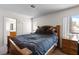 Bedroom with a large bed and a window view at 2042 Waverly Cir, Henderson, NV 89014