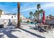 Inviting backyard pool and spa surrounded by lush landscaping and a spacious patio for relaxing poolside at 2042 Waverly Cir, Henderson, NV 89014