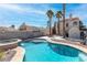 Backyard pool with spa, patio, and surrounding landscaping at 2042 Waverly Cir, Henderson, NV 89014
