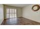 Living room with tile flooring and sliding glass doors leading to a patio at 2120 Ramrod Ave # 415, Henderson, NV 89014