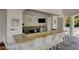 Bar with granite counters and seating at 222 Karen Ave # 1904, Las Vegas, NV 89109