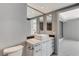 Stylish bathroom with a modern vanity, featuring a large mirror and marble countertops at 222 Karen Ave # 1904, Las Vegas, NV 89109