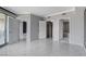 Modern bedroom featuring marble tile flooring, walk-in closet, and access to the bathroom at 222 Karen Ave # 1904, Las Vegas, NV 89109
