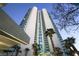 Stunning exterior view of a modern high-rise building with palm trees at 222 Karen Ave # 1904, Las Vegas, NV 89109