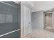 Neutral hallway with a clean gray wall paint, white doors, and glossy marble floor at 222 Karen Ave # 1904, Las Vegas, NV 89109