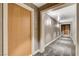 Hallway view with textured wallpaper and modern carpeting at 222 Karen Ave # 1904, Las Vegas, NV 89109