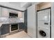 Gourmet kitchen area featuring stainless steel appliances and in-unit laundry at 222 Karen Ave # 1904, Las Vegas, NV 89109