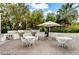 Outdoor kitchen with built-in grills and dining area at 222 Karen Ave # 1904, Las Vegas, NV 89109