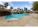 Resort-style pool with rock waterfall feature at 222 Karen Ave # 1904, Las Vegas, NV 89109