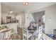 Connected dining and living spaces with ample light and comfortable modern decor at 2609 Orchard Meadows Ave, Henderson, NV 89074