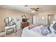 Spacious main bedroom featuring a dressing table, TV and ensuite bathroom at 2609 Orchard Meadows Ave, Henderson, NV 89074