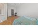 Bright bedroom featuring a queen bed and a door at 2920 Foxtail Creek Ave, Henderson, NV 89052