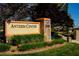 Anthem Center community sign with stone accents, manicured landscaping, and green lawn at 2920 Foxtail Creek Ave, Henderson, NV 89052
