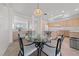 Eat-in kitchen offering ample cabinetry and views of the living spaces at 2920 Foxtail Creek Ave, Henderson, NV 89052