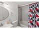 Bathroom featuring a shower-tub combo and stylish patterned shower curtain at 2963 Greendale St, Las Vegas, NV 89121
