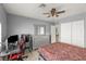 Bedroom featuring a comfortable bed, desk, and dresser, perfect for rest and productivity at 2963 Greendale St, Las Vegas, NV 89121