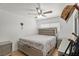 Bright bedroom featuring a ceiling fan, neutral decor, and a comfortable bed at 2963 Greendale St, Las Vegas, NV 89121
