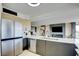 Kitchen featuring stainless steel appliances, marble counters, and modern finishes at 3111 Bel Air Dr # 5F, Las Vegas, NV 89109