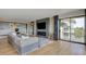 Modern living room featuring a large sectional sofa, fireplace, and balcony access at 3111 Bel Air Dr # 5F, Las Vegas, NV 89109