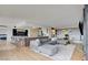 Open-concept living area with kitchen, living room, and office space at 3111 Bel Air Dr # 5F, Las Vegas, NV 89109