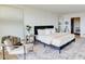 Sunlit main bedroom with a seating area offers comfortable furnishings and ample space at 3111 Bel Air Dr # 5F, Las Vegas, NV 89109