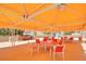 The covered outdoor dining area boasts comfortable seating with a barbeque, perfect for entertaining guests at 3111 Bel Air Dr # 5F, Las Vegas, NV 89109
