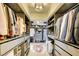 Spacious walk-in closet with custom shelving and drawers, offering ample storage at 3111 Bel Air Dr # 5F, Las Vegas, NV 89109