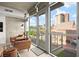 Balcony view with clear city and rooftop views from seating area; modern architecture at 353 E Bonneville Ave # 311, Las Vegas, NV 89101