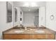 Bright bathroom features a double vanity with granite countertops and a large mirror at 353 E Bonneville Ave # 311, Las Vegas, NV 89101