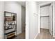 Hallway with storage shelves leading to walk-in closet at 353 E Bonneville Ave # 311, Las Vegas, NV 89101