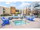 Community hot tub with stylish outdoor seating and landscaping at 353 E Bonneville Ave # 311, Las Vegas, NV 89101