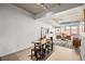 Spacious living area with dining table and a view of the outdoor area offering a comfortable place to relax at 353 E Bonneville Ave # 311, Las Vegas, NV 89101