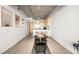 Open living area featuring dining table to kitchen connection enhancing flow and creating a dynamic living experience at 353 E Bonneville Ave # 311, Las Vegas, NV 89101