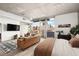 Bright living area with comfortable seating, city views, and modern decor and access to balcony at 353 E Bonneville Ave # 311, Las Vegas, NV 89101