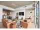 Open-concept living space with modern kitchen, dining area, and comfortable seating arrangement at 353 E Bonneville Ave # 311, Las Vegas, NV 89101